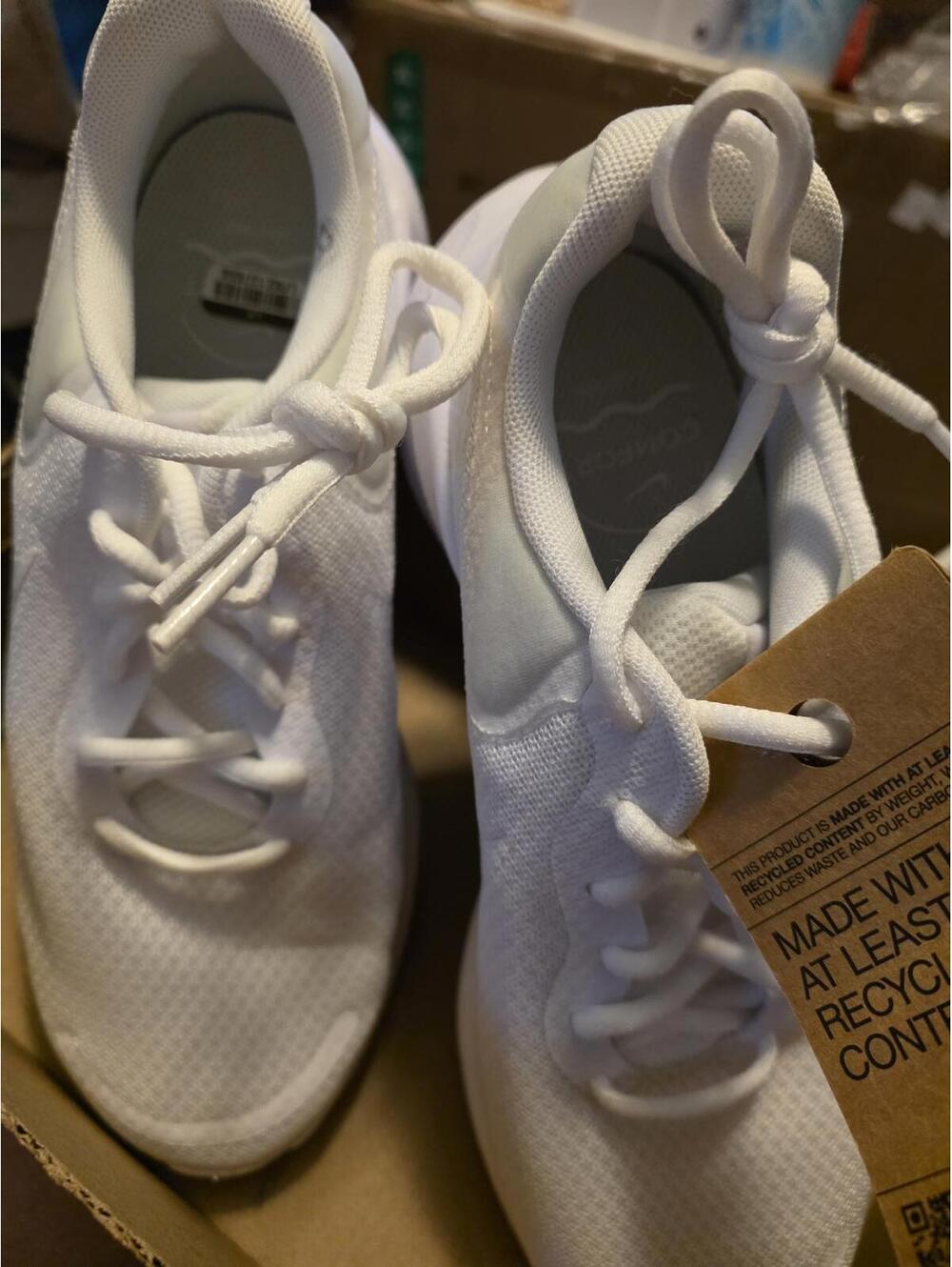 White on white Nike Revolution 7 size 7.5 women size 6 men